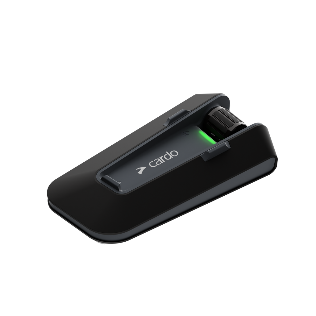 CARDO Packtalk Neo Bluetooth intercom unit mounted on helmet