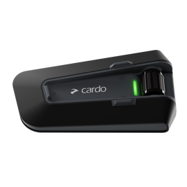 CARDO Packtalk Neo Bluetooth intercom unit mounted on helmet
